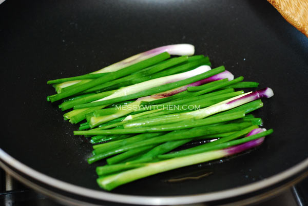 Place Spring Onions On Pan
